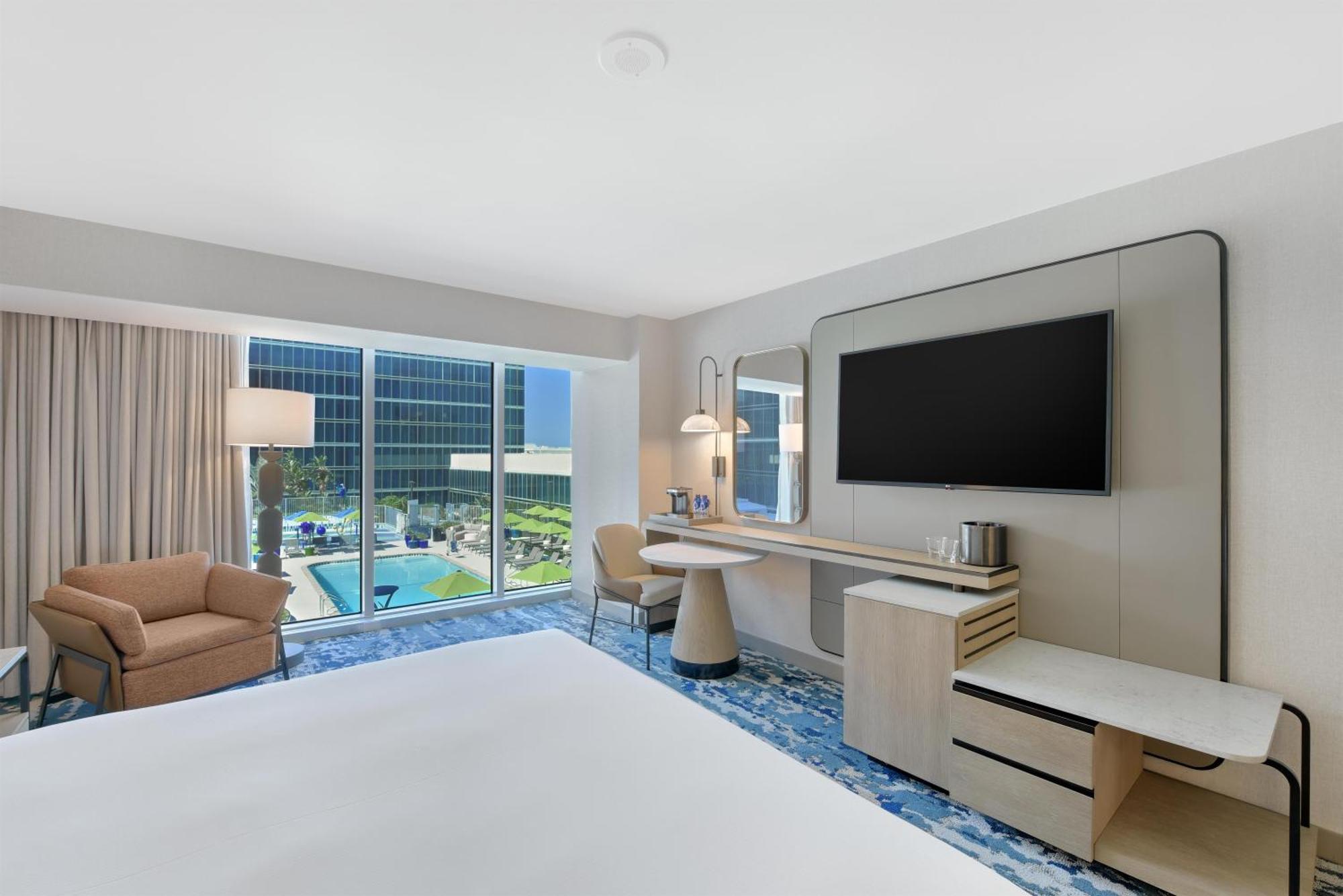 Queen Room Two Queen Beds Pool View Roll Shower Mobility Accessible
